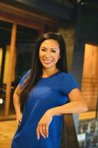 Jeanie Nguyen, President, in blue top